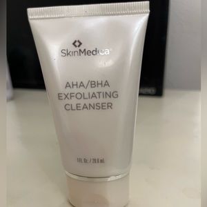 Brand new never opened. Mini AHA/BHA Exfoliating Cleanser